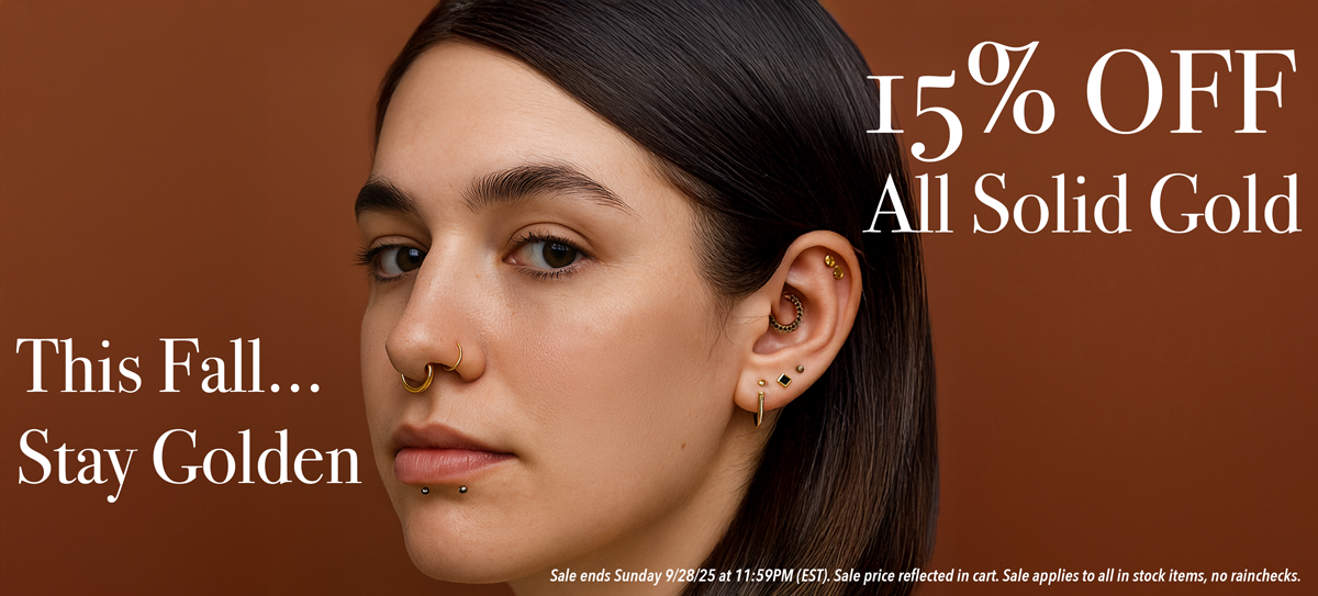 woman with solid gold ear and nose curation on a banner announcing a sale