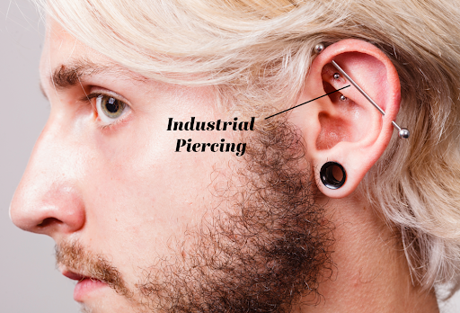 side view of man with an industrial piercing