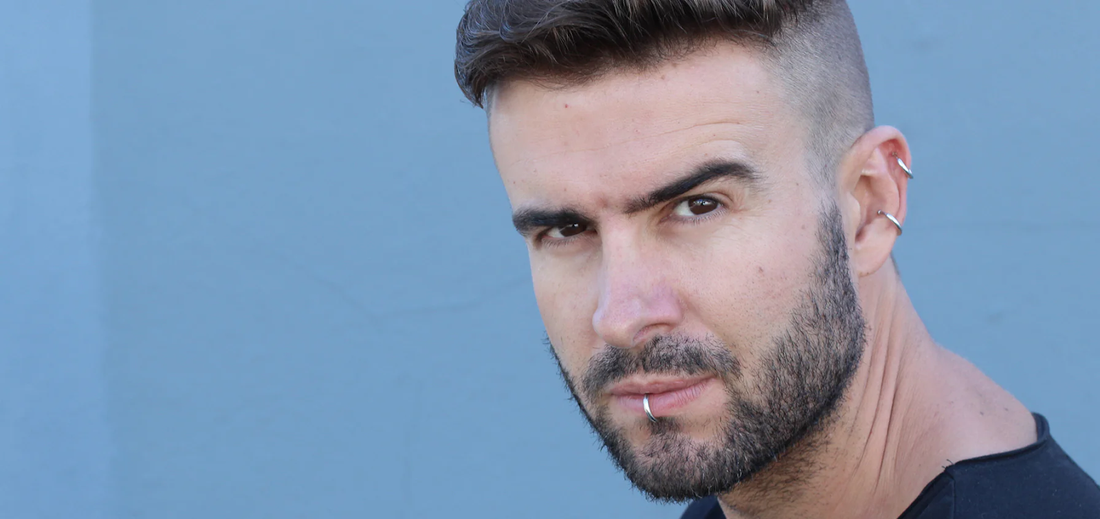 man with conch rings