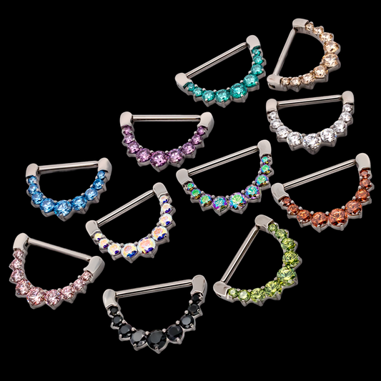 nipple clickers in different colors on black ground