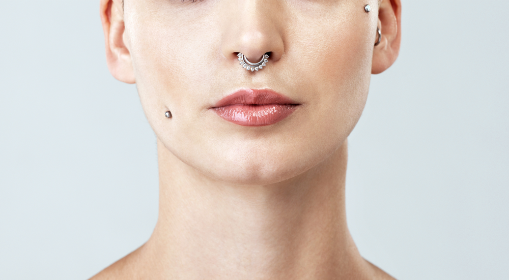 face with septum piercing
