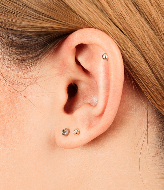 ear with three studs