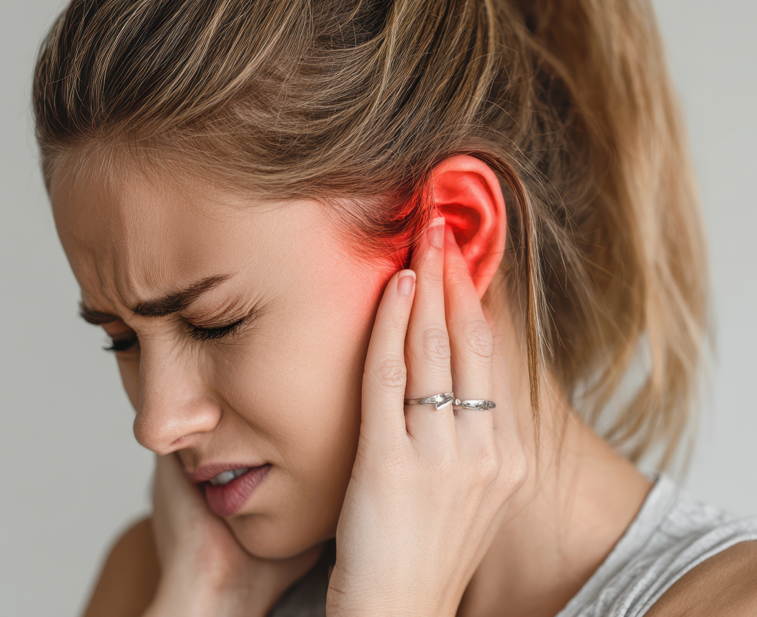 woman with infected ear piercing