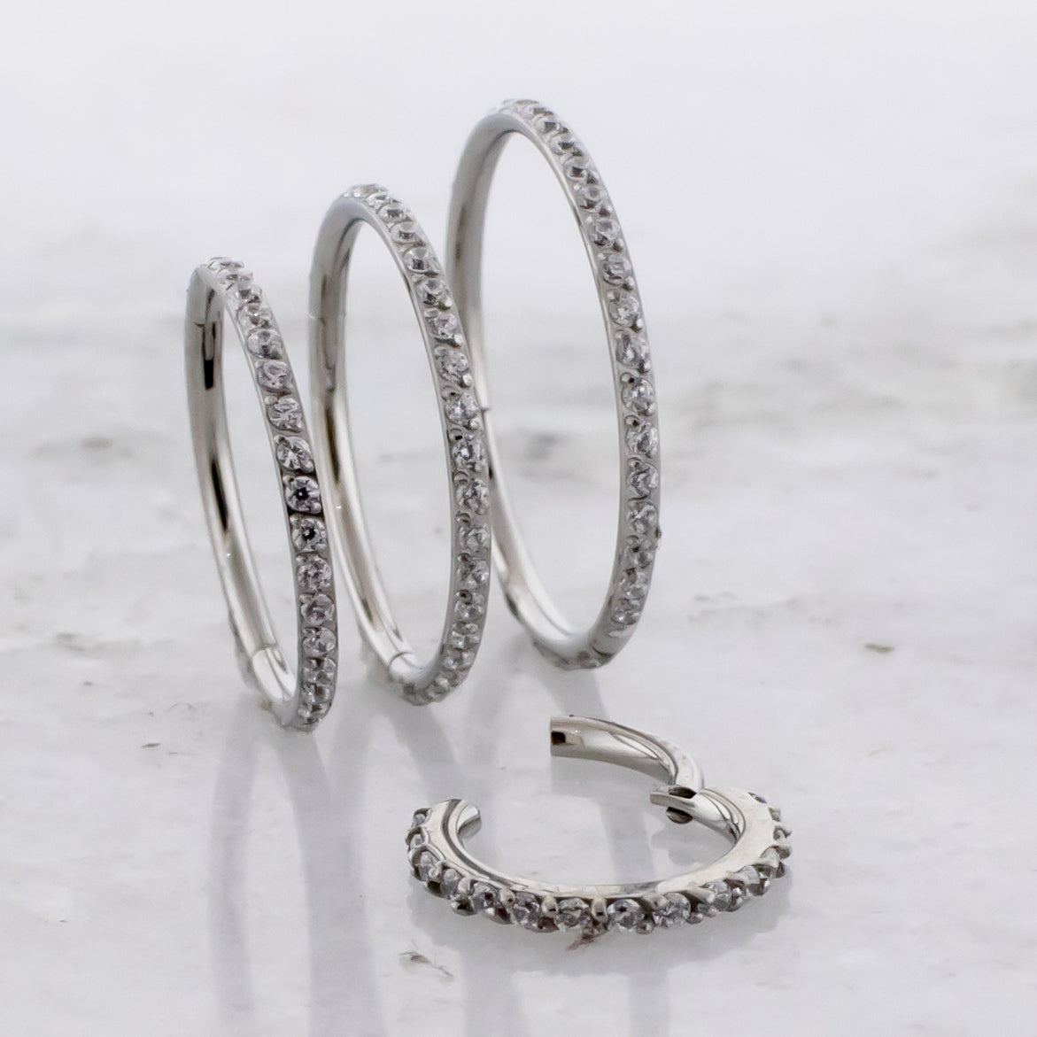 18G - 16G Steel Hinged Segment Rings With Clear Gems