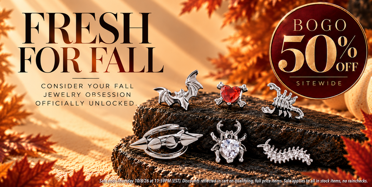 fall themed jewelry on a rock with fall themed background announcing a sale