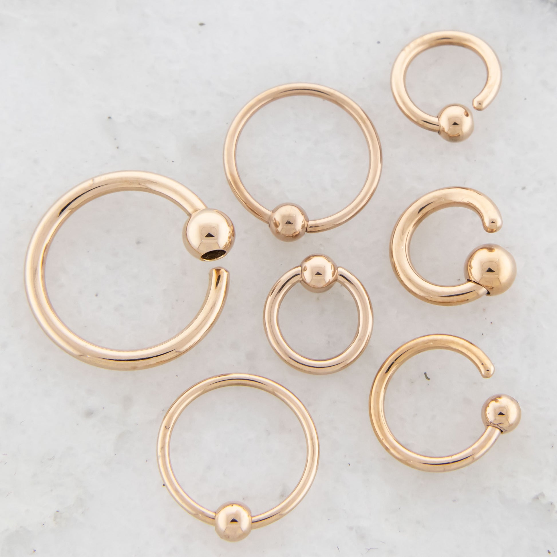 14G - 20G Rose Gold Plated Steel Fixed Bead Captive Rings